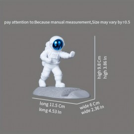 Spice Up Your Desk with this Astronaut-Themed Phone Holder - Perfect for Office Decor!
