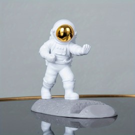Spice Up Your Desk with this Astronaut-Themed Phone Holder - Perfect for Office Decor!